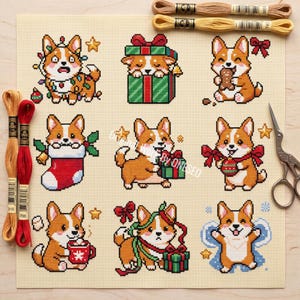 May include: A cross-stitch pattern on cream fabric featuring nine Corgi dog illustrations with holiday themes, including Corgis with Christmas lights, gifts, stockings, and cocoa. Includes two tan and one red embroidery floss skeins and scissors.