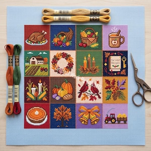 May include: A cross-stitch sampler on light blue fabric featuring sixteen autumn-themed squares including a turkey, cornucopia, harvest recipes book, pumpkins, cardinals, and a tractor. Includes four skeins of embroidery floss and metal scissors.
