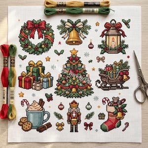 May include: A cross-stitch pattern on white fabric featuring a Christmas tree, wreath, lantern, sleigh, nutcracker, stocking, and gifts. Includes red, green, and gold embroidery floss skeins and silver scissors. The design displays festive holiday motifs.