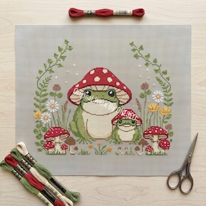 コテージコアのカエルのクロスステッチパターンPDF、魔女のキノコ帽子のヒキガエル、簡単な刺繍チャート