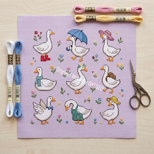 May include: A cross-stitch pattern featuring nine whimsical geese, each adorned with unique accessories like boots, hats, and umbrellas, set against a lavender background. Embroidery floss and scissors are also visible. The text "Original Work by ONESEO" is also visible.
