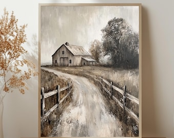 May include: A framed wall art print featuring a neutral-toned landscape painting of a rustic barn situated at the end of a dirt path. The scene includes a wooden fence lining the road, tall dry grasses, and a large tree under a cloudy sky.