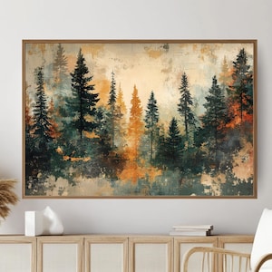 Könnte beinhalten: Gerahmtes Landschaftsgemälde, das eine Waldszene mit hohen, immergrünen Bäumen in Grün- und Orangetönen zeigt. Das Kunstwerk hat einen strukturierten, abstrakten Stil, wobei ein warmes, goldenes Licht die Bäume beleuchtet. Der Rahmen ist warmbraun.