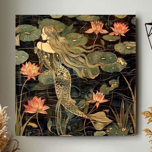 May include: Square canvas art featuring a mermaid swimming in a pond with lily pads and lotus flowers. The mermaid has long flowing hair and a scaled tail. The artwork uses a muted color palette of greens, pinks, and golds, creating a vintage aesthetic.