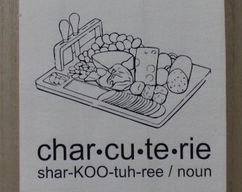 May include: A black and white illustration of a charcuterie board with various meats, cheeses, and crackers. The text "char-cu-te-rie" is written in black below the image, along with the pronunciation and definition: "shar-KOO-tuh-ree / noun a fancy French term for adult Lunchables."