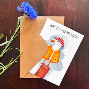 Illustrierte Postkarte / Grußkarte mit einer Möwe im gelben Regenmantel / Plattdeutsche Postkarte / Grußkarte / Lustige Karte