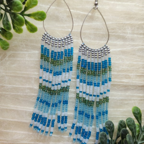 Beautiful handmade chandelier earrings in beachy colors!  Approx 3.5" in length. Hypo allergenic stainless wires.