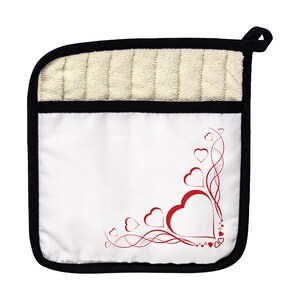 May include: White pot holder with a black border and a red heart design. The design features a large heart with smaller hearts and swirls.
