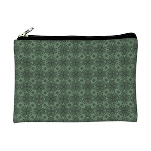May include: A green zippered pouch with a repeating pattern of four-leaf clovers.