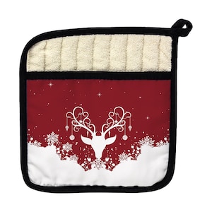 May include: Red and white Christmas pot holder with a white reindeer silhouette with antlers and ornaments. The reindeer is on a red background with white snowflakes and stars.