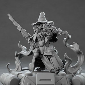 May include: A gray 3D printed miniature of a wizard holding a gun and a book. The wizard is wearing a pointed hat and a long robe. The miniature is standing on a platform with flames coming out of the sides.