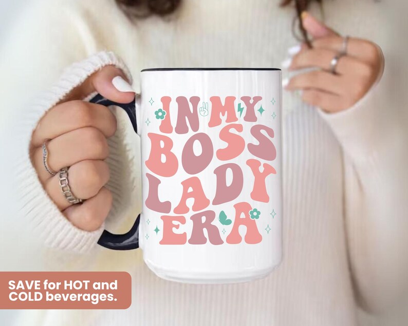 May include: White ceramic mug with a pink, green and blue design that says "In My Boss Lady Era".