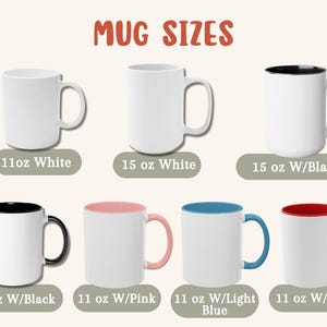 May include: Six different sizes of white ceramic mugs with various colored rims. The mugs are arranged in two rows of three. The sizes are 11 oz white, 15 oz white, 15 oz with black rim, 11 oz with black rim, 11 oz with pink rim, 11 oz with light blue rim, and 11 oz with red rim.