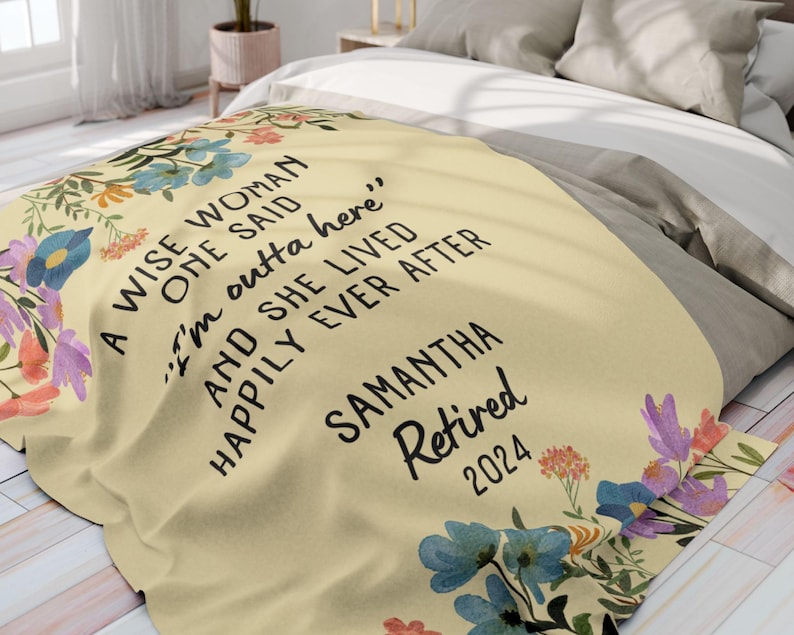 May include: A yellow floral throw blanket with the text "A wise woman once said 'I'm outta here' and she lived happily ever after Samantha Retired 2024".