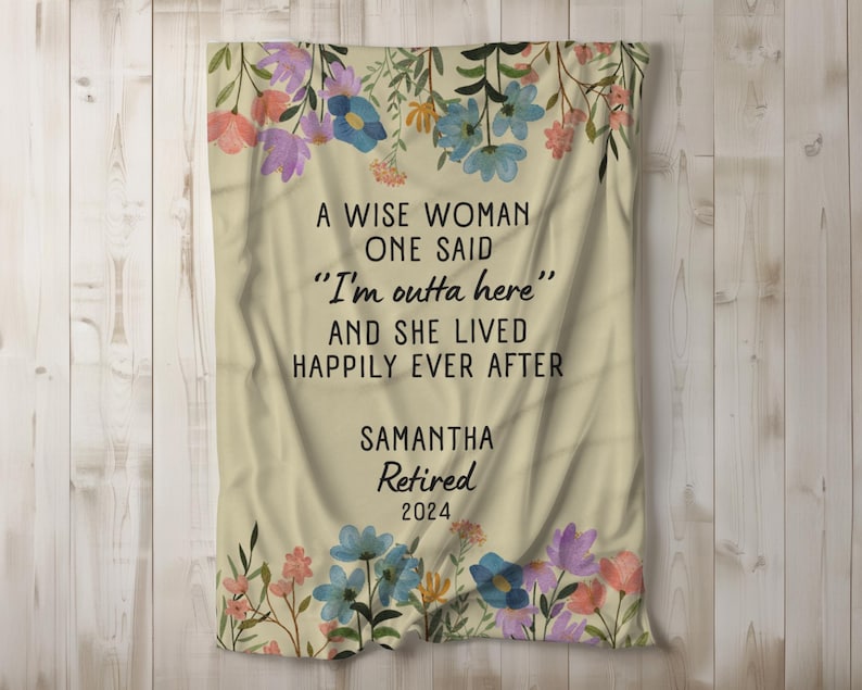 May include: A beige throw blanket with a floral design and the text "A wise woman one said "I'm outta here" and she lived happily ever after" with the name Samantha and the year 2024.