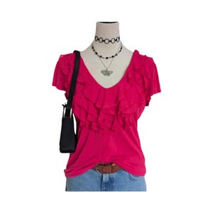 May include: A set of three ceramic mugs with a speckled, matte finish. The mugs are in shades of cream, light gray, and dark gray. Each mug has a simple, minimalist design, perfect for coffee or tea.