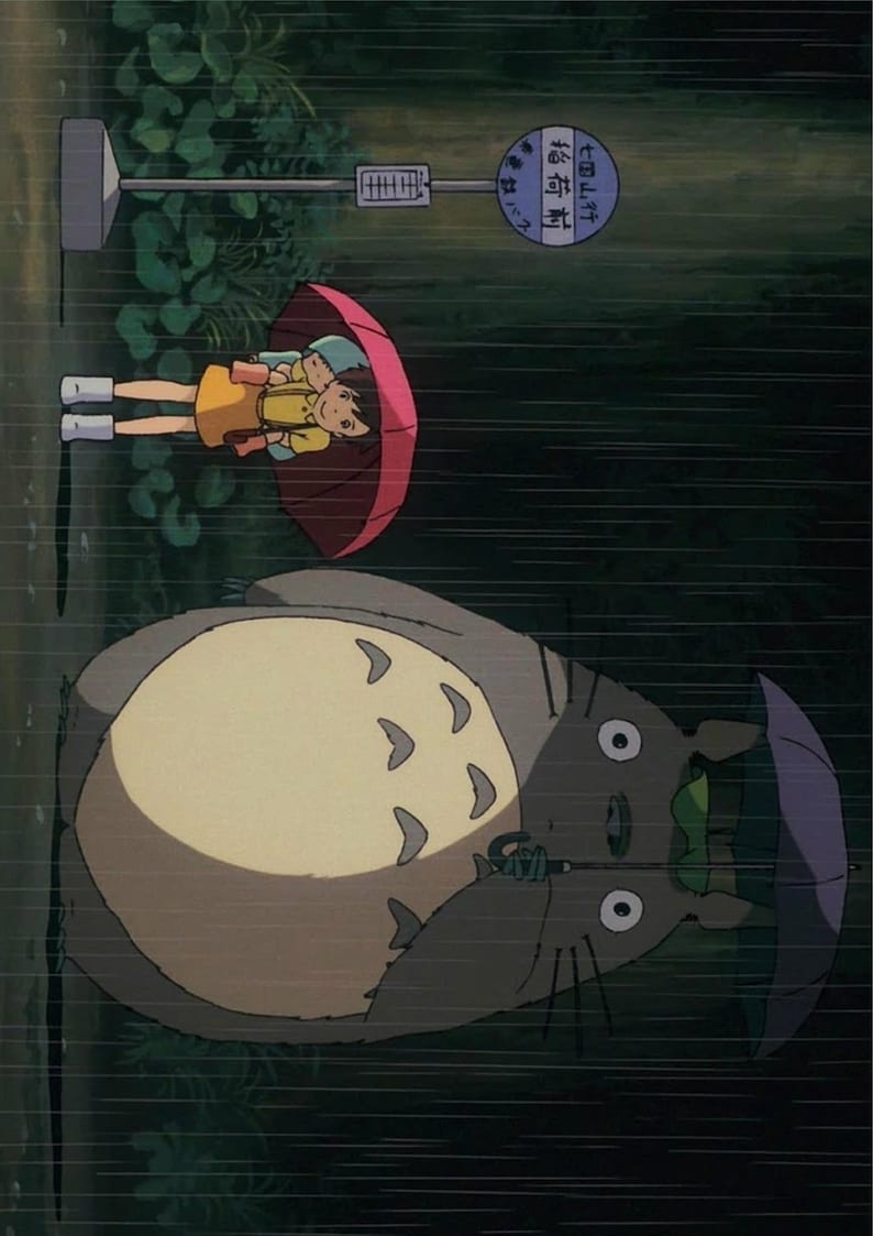 May include: An animated scene from a rainy day. Two children under a red umbrella stand near a bus stop. A large, gray, furry creature with a leaf on its head holds a purple umbrella.