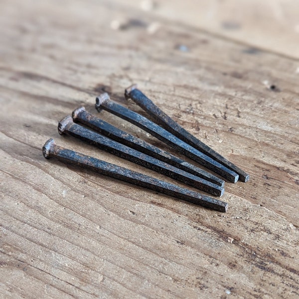 Set of five 3" antique iron hand-forged square cut nails salvaged from an 1850s Sea Captain's house on the Maine coast