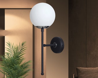 Modern White Globe Wall Sconce with Black Metal Chrome Accents, Elegant Orb Wall Light Fixture for Contemporary Decor Inscapes Design