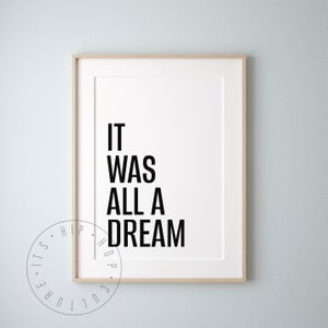 Puede incluir: Una impresi&oacute;n enmarcada con el texto "IT WAS ALL A DREAM" en letras negras sobre un fondo blanco.