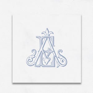 May include: A light blue monogram design featuring the letters "LA" intertwined with ornate flourishes and a decorative top element. The design is centered on a white square background, creating a classic and elegant aesthetic.