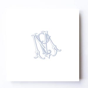 May include: A light blue monogram design featuring the intertwined letters "NM" in an elegant, ornate script. The design is centered on a white background, with decorative flourishes and a classic, formal aesthetic.
