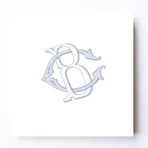 May include: A square white card featuring a centered, light blue monogram logo. The design consists of an intertwined letter B and letter C, rendered in a classic serif typeface with fine, etched-style line detailing throughout the characters.