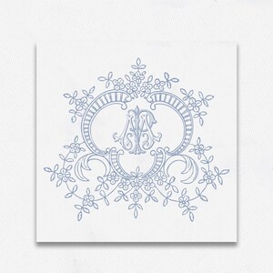 May include: A blue monogram with the letters "MA" in a decorative, ornate frame with floral accents.