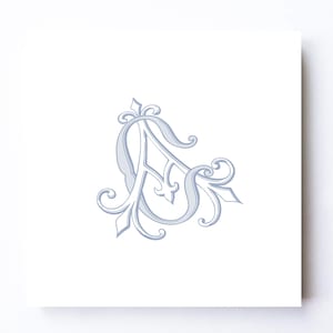 May include: A light blue decorative monogram featuring the letter A in a stylised, calligraphic script. The design includes intricate, swirling flourishes and ornate lines that extend from the central character, creating a balanced, symmetrical appearance.