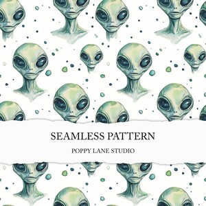 May include: A seamless pattern featuring watercolor illustrations of green alien heads with large black eyes. The background is white with scattered blue and green dots.