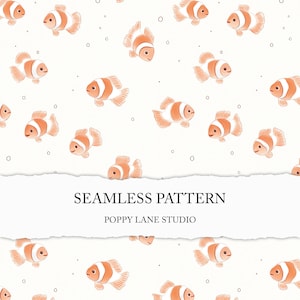 May include: A seamless pattern featuring orange and white clownfish on a white background. The pattern is repeated throughout the image. The text "Seamless Pattern" and "Poppy Lane Studio" is at the bottom of the image.