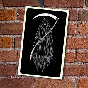 May include: Black and white illustration of the Grim Reaper holding a scythe. The Reaper is wearing a hooded robe and has a skeletal face. The background is black with white stars.