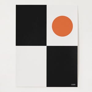 May include: A modern art print with a geometric design. The artwork features a grid of four squares: two black, two white, and an orange circle in the upper right quadrant. The artist's name, "CASEK," is in the lower right corner.