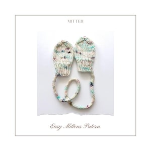 May include: A pair of white knitted baby mittens with a colourful speckled pattern and a matching string tie. The mittens are on a white background and the text "Easy Mittens Pattern" is below them.