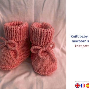 May include: A pair of soft pink knitted baby boots. The boots have a ribbed cuff and a bow detail on the front. The text "Knitt baby boots newborn shoes knitt pattern" is visible on the right side of the image.