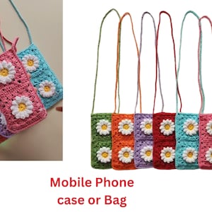 May include: Crocheted mobile phone cases or bags in various colors, including green, orange, purple, red, blue, and pink. Each case features a large white daisy with a yellow center. The bags have long, colorful straps.