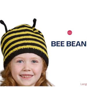 May include: A child wearing a yellow and black striped bee beanie with antennae. The beanie is knitted and has a cute, whimsical design.