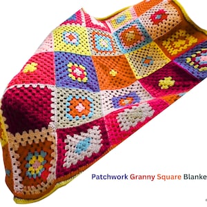 May include: A colorful patchwork granny square blanket. The blanket features a variety of squares in shades of red, orange, yellow, blue, and purple. The blanket is made of yarn and has a textured appearance. The text "Patchwork Granny Square Blanket" is visible.