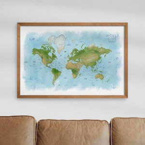 May include: A framed world map with a watercolor effect. The map features green landmasses against a blue background, with the text "WORLD DIVE MAP" in the upper right corner. The frame is made of wood.