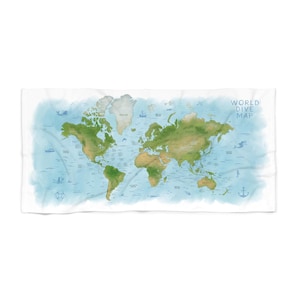 May include: A rectangular beach towel featuring a world map with a watercolor effect. The map shows continents in shades of green and brown, surrounded by a light blue ocean. The text "WORLD DIVE MAP" is in the upper right corner.