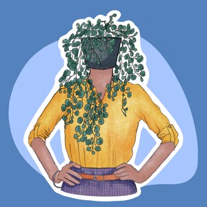 May include: A yellow blouse with a potted plant covering the head of the person wearing it. The plant is a trailing vine with green leaves. The person is wearing a purple and brown plaid skirt with a brown belt.