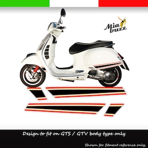 May include: A white scooter with black and red accents, featuring a black seat and red suspension. The image includes a set of black, red, and white decals. Text on the image reads "Mia Buzz" and "Design to fit on GTS / GTV body type only."