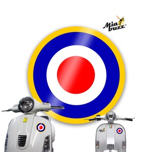 May include: White scooters with a target design in red, white, blue, and yellow. The scooters have a headlight and handlebars. The Mia Buzz logo is visible in the top right corner.
