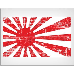 May include: A red and white distressed Japanese flag with a large red circle in the center. The flag has a worn and faded look, giving it a vintage feel.