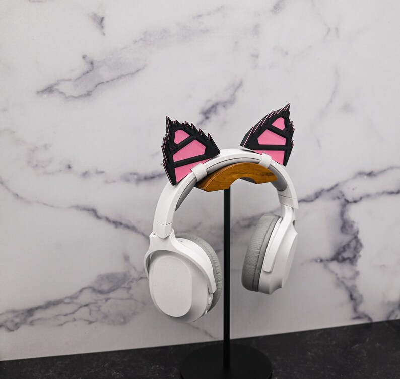 spikey futuristic wolf ears which attach to a headset with hook and loop