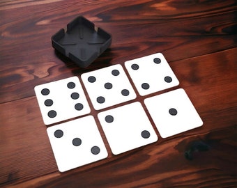 May include: A set of six white dominoes with black dots on a wooden surface. The dominoes are arranged in a grid pattern.