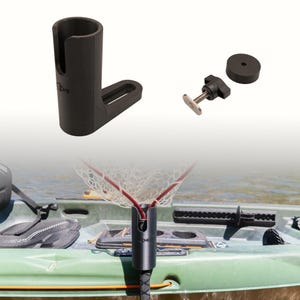 May include: A black cylindrical fishing net holder with a vertical slot and a horizontal mounting base, accompanied by a black plastic knob with a metal bolt and a circular washer, shown mounted on the side of a green kayak holding a net.