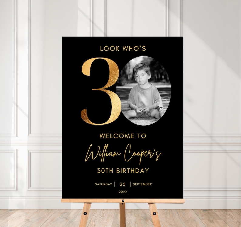 May include: Black and gold welcome sign with a photo of a young boy. The sign says "Look Who's 30" and "Welcome to William Cooper's 30th Birthday". The date is Saturday, September 25, 202X.