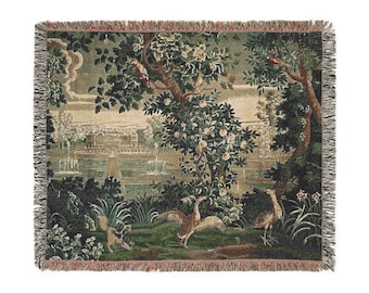 May include: A tapestry throw featuring a detailed depiction of a lush garden scene with a large manor house in the background. The tapestry is woven with intricate details, including birds, flowers, and trees. The colors are muted and earthy, with shades of green, brown, and beige.