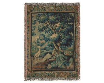 May include: A tapestry throw blanket with a woven design of a tree, birds, and foliage in shades of green, brown, and beige.